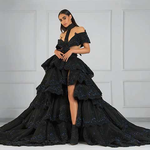 model posing in black gown